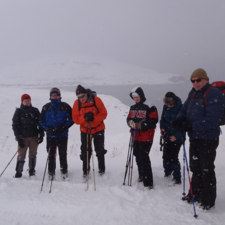 Logn en snjókoma var í upphafi ferðar.